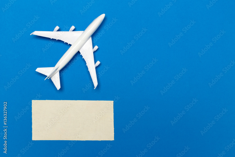 model of passenger plane on blue background model of passenger plane on blue background