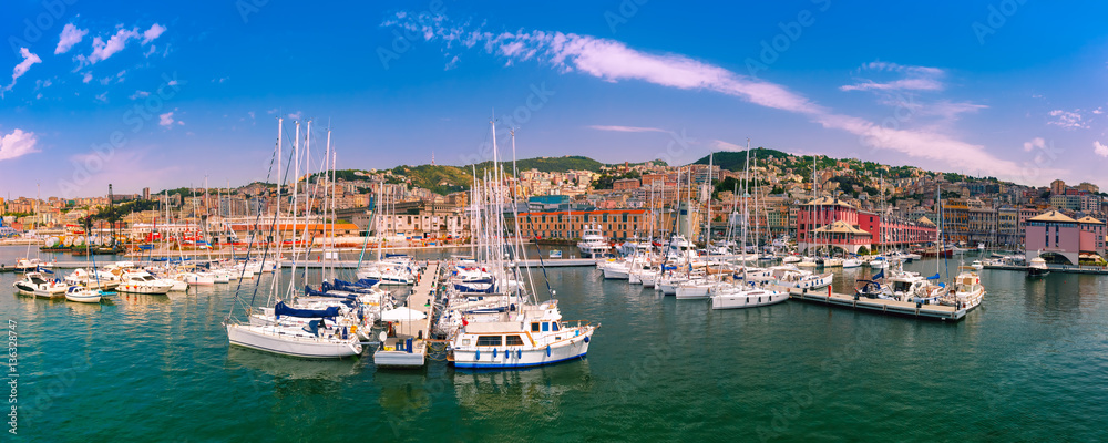 Panorama of marina Porto Antico Genova, where many sailboats and yachts are moored, Genoa, Italy.
