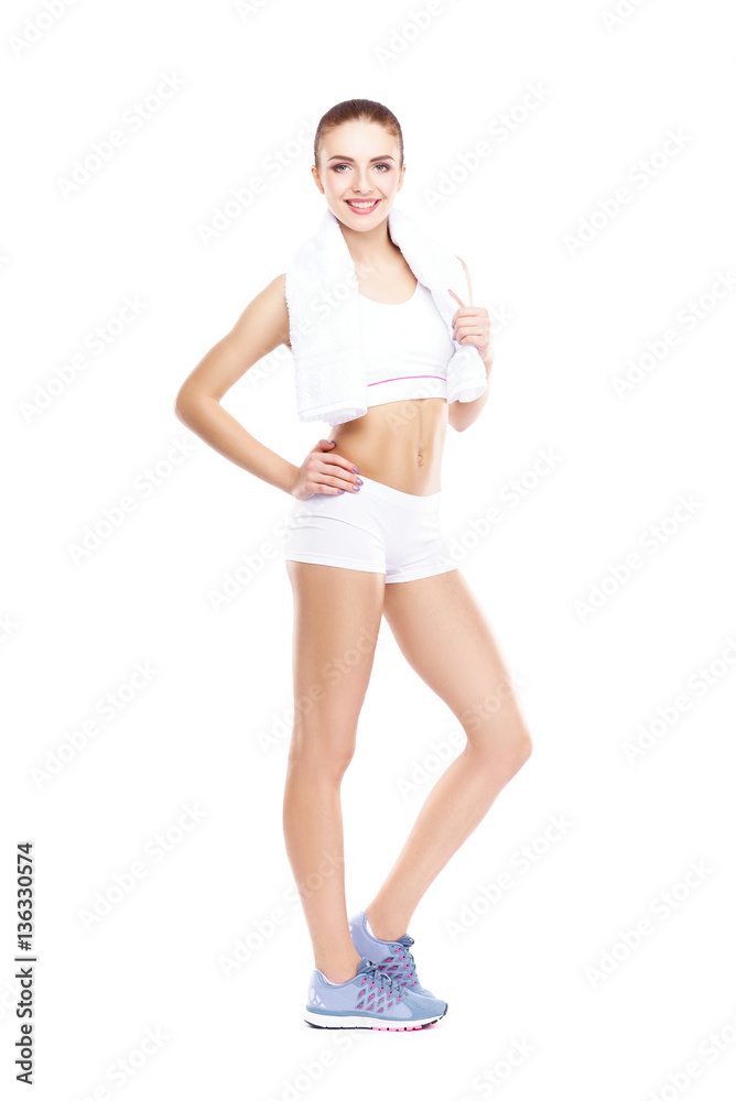 Fit, healthy and sporty woman in sportswear isolated on white. Fit, healthy and sporty woman in sportswear isolated on white.