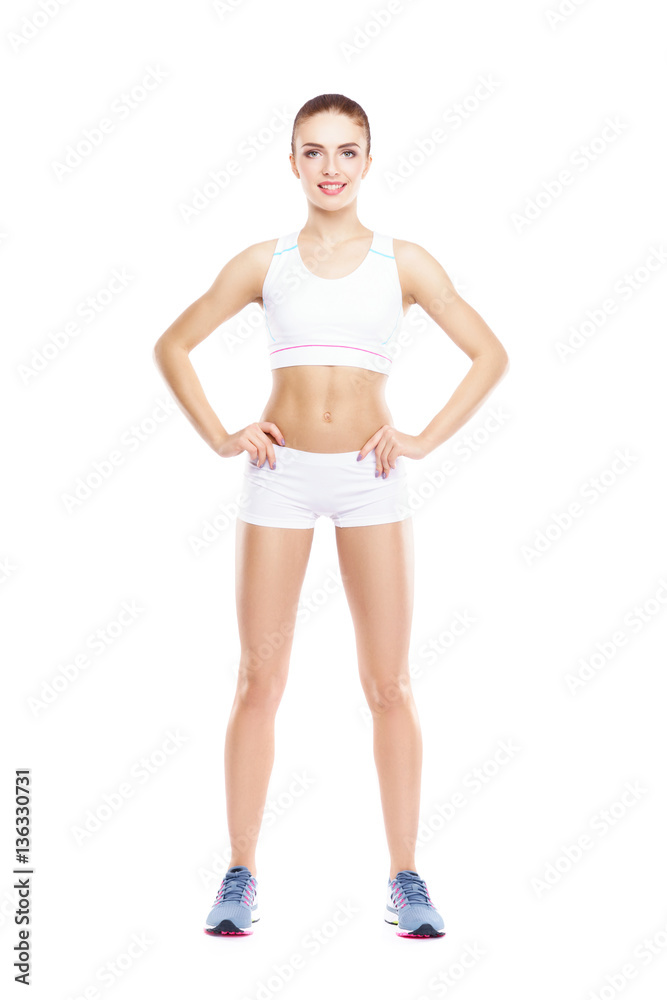 Fit, healthy and sporty woman in sportswear isolated on white. Fit, healthy and sporty woman in sportswear isolated on white.