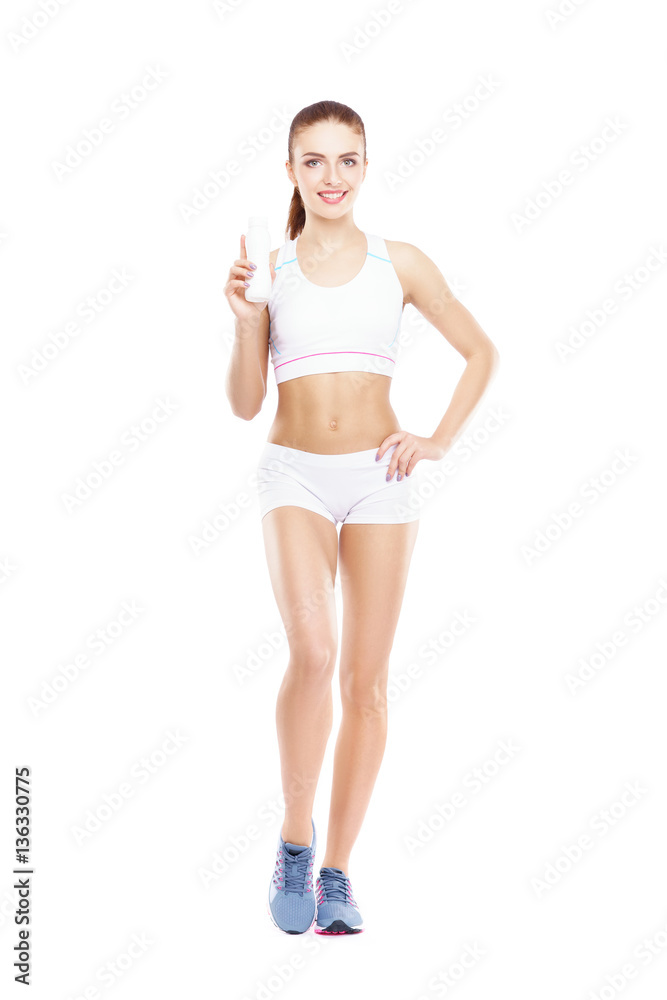 Fit, healthy and sporty woman in sportswear isolated on white. Fit, healthy and sporty woman in sportswear isolated on white.