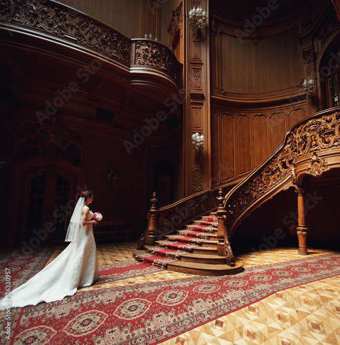 beautiful stylish bride on the background luxurious interior