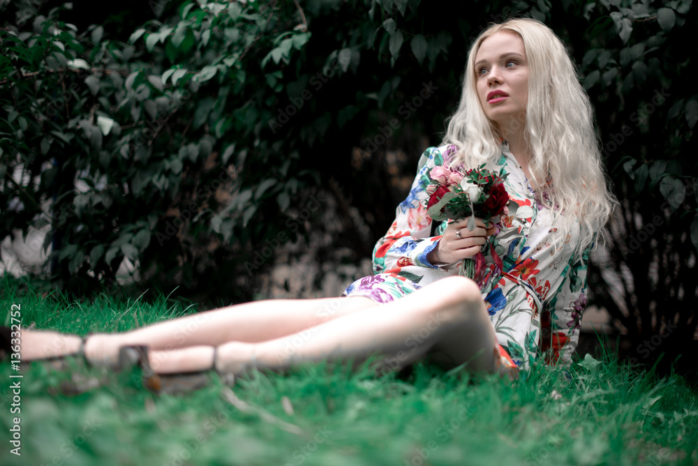 happy young blondie european woman on the grass happy young blondie european woman on the grass