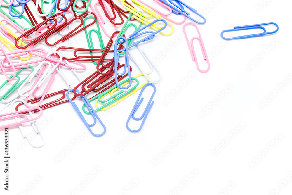 multi-colored paper clips on white background multi-colored paper clips on white background