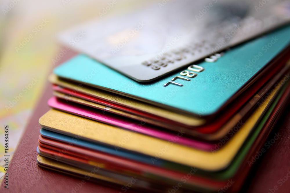 stack of bright colorful discount plastic cards, close up view stack of bright colorful discount plastic cards, close up view