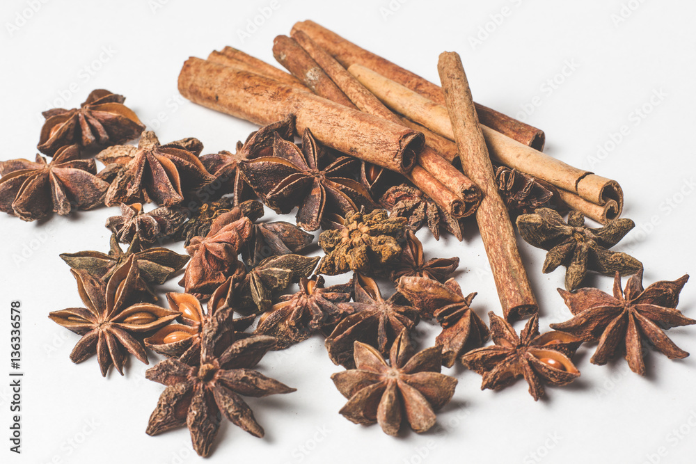 cinnamon stick and star anise spice isolated on white background closeup cinnamon stick and star anise spice isolated on white background closeup