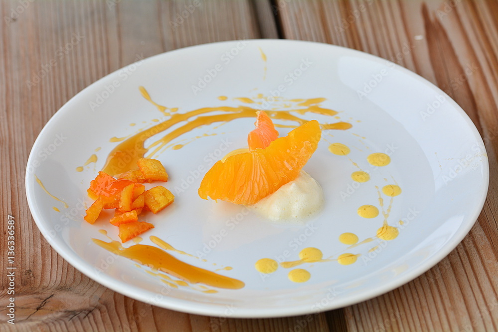 The orange dessert with cream and honey The orange dessert with cream and honey