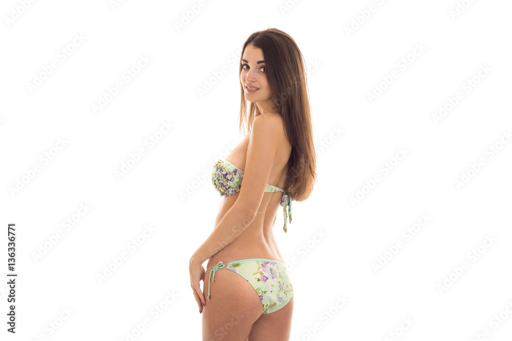 sexual slim young lady with big natural breast posing in swimsuit isolated  on white background Stock Photo | Adobe Stock