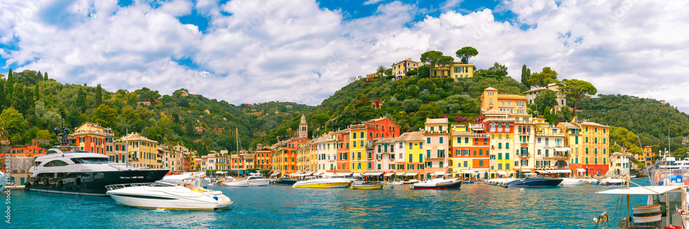 Panoramic view of picturesque harbour of Portofino fishing village on the Italian Riviera, Liguria, Italy.