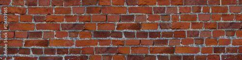 panorama brick wall orange masonry uneven wide and narrow stone