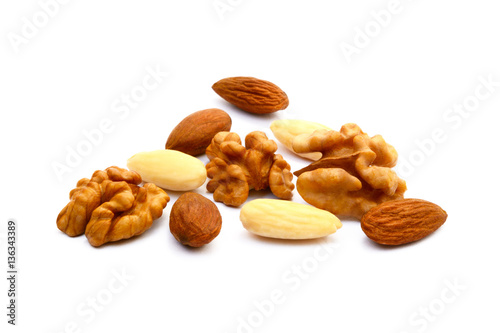 Almond and walnut isolated on white background