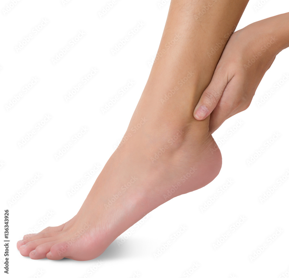 woman hand holding her foot and massaging ankle in pain area, Isolated on white background.