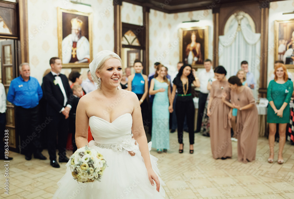 Beautiful stylish bride throws the bouquet Beautiful stylish bride throws the bouquet