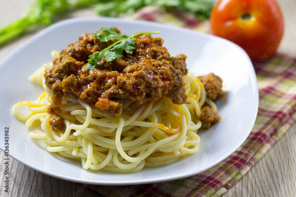Spaghetti Bolognese on white plate