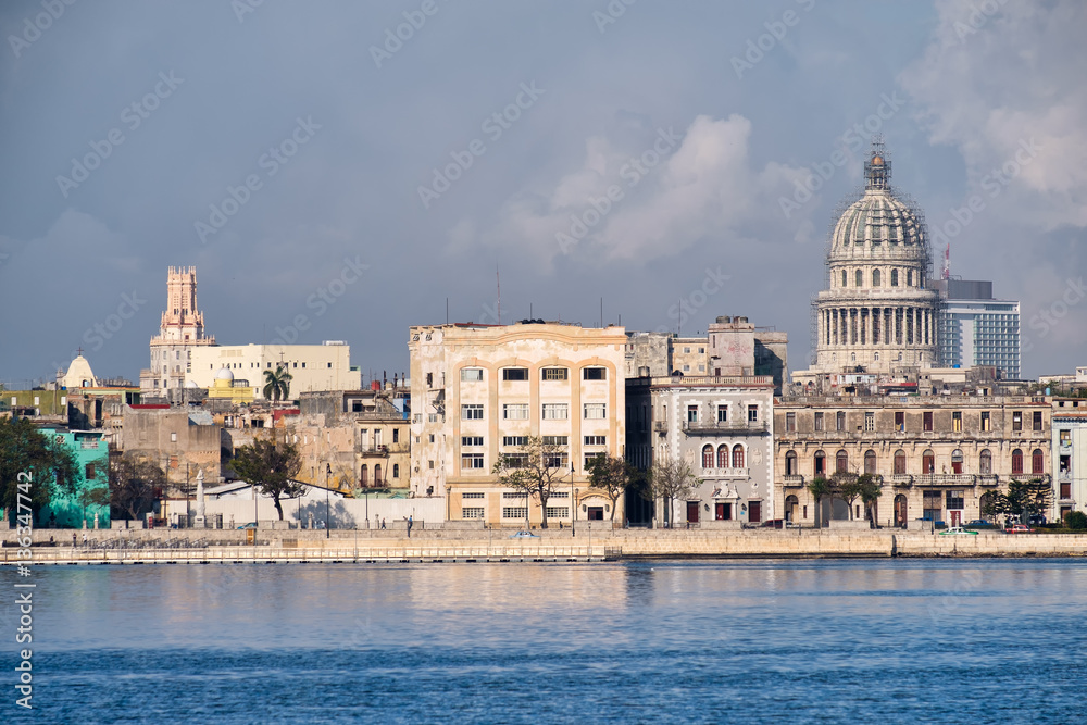 Old Havana buildings  along the bay with a view of the Capitol