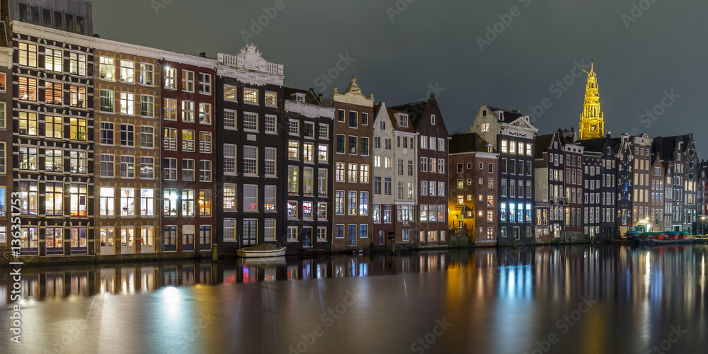 Amsterdam Rokin, old ware houses standing on wooden poles in the canals over 800years