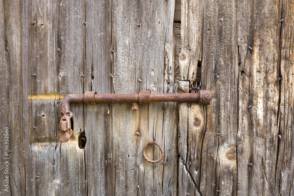 Old lock on doors in Dalmatia Old lock on doors in Dalmatia