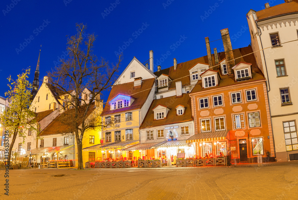 Bright night streets of old town. Riga, Latvia