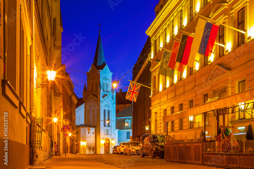 Fototapeta Naklejka Na Ścianę i Meble -  Bright night streets of old town. Riga, Latvia