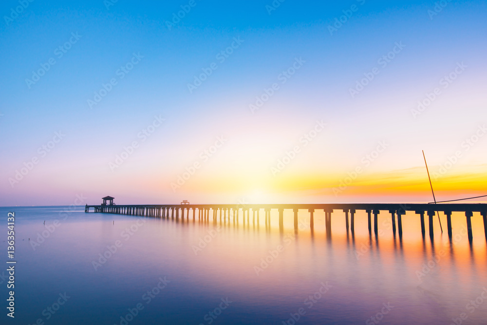 Vacation and Holiday concept - Wooden pier between sunset in Samut Prakan, Thailand,Summer, Travel