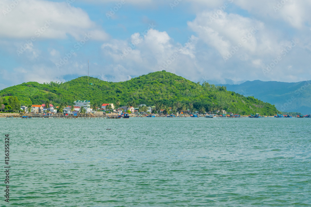 Sea landscape with island shore and clouds - the South China sea - Vietnam, Nha Trang bay
