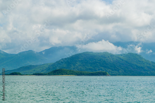 Sea landscape with island shore and clouds - the South China sea - Vietnam, Nha Trang bay