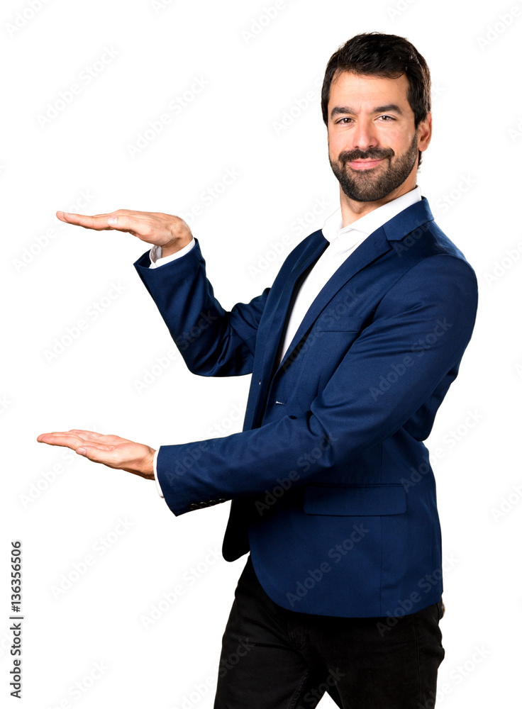 Handsome man holding something Handsome man holding something