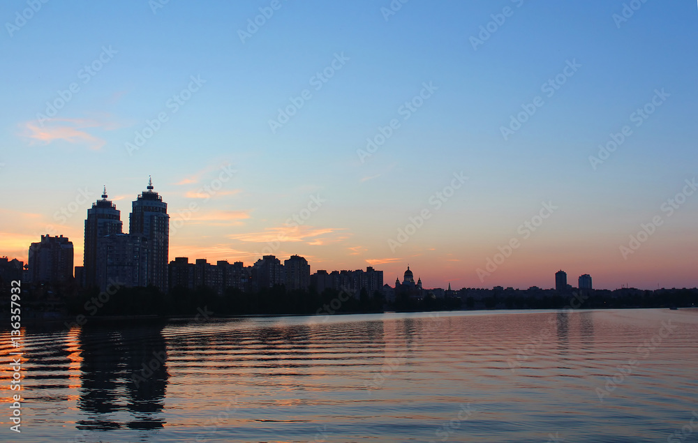 Obolon skyline near the Dniepro river in Kyiv. It is sunset time