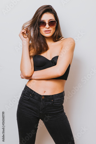 Portrait of a beautiful long hair woman with sunglasses-studio photo © AH! Studio