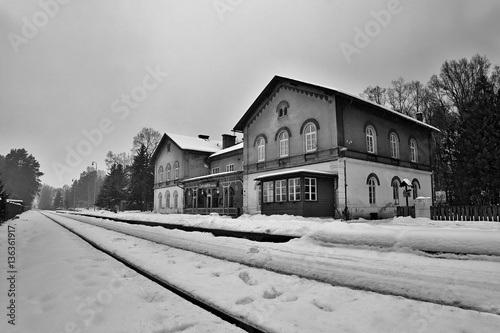 Fototapeta Naklejka Na Ścianę i Meble -  Zahradky, Machuv kraj, Czech republic - February 04, 2017: Historical building of the railway station Zahradky u Ceske lipy in winter