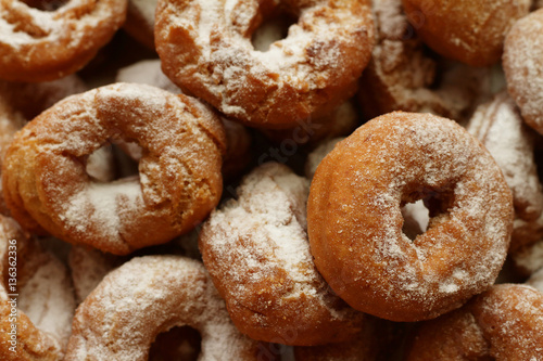 Sweet donuts covered with sugar.