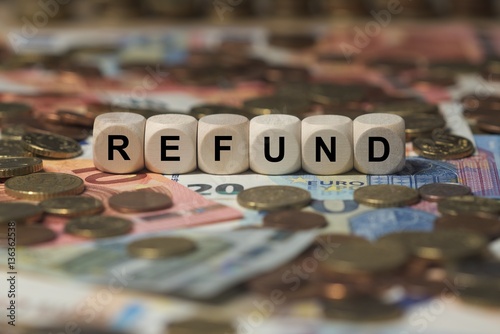 refund - cube with letters, money sector terms - sign with wooden cubes