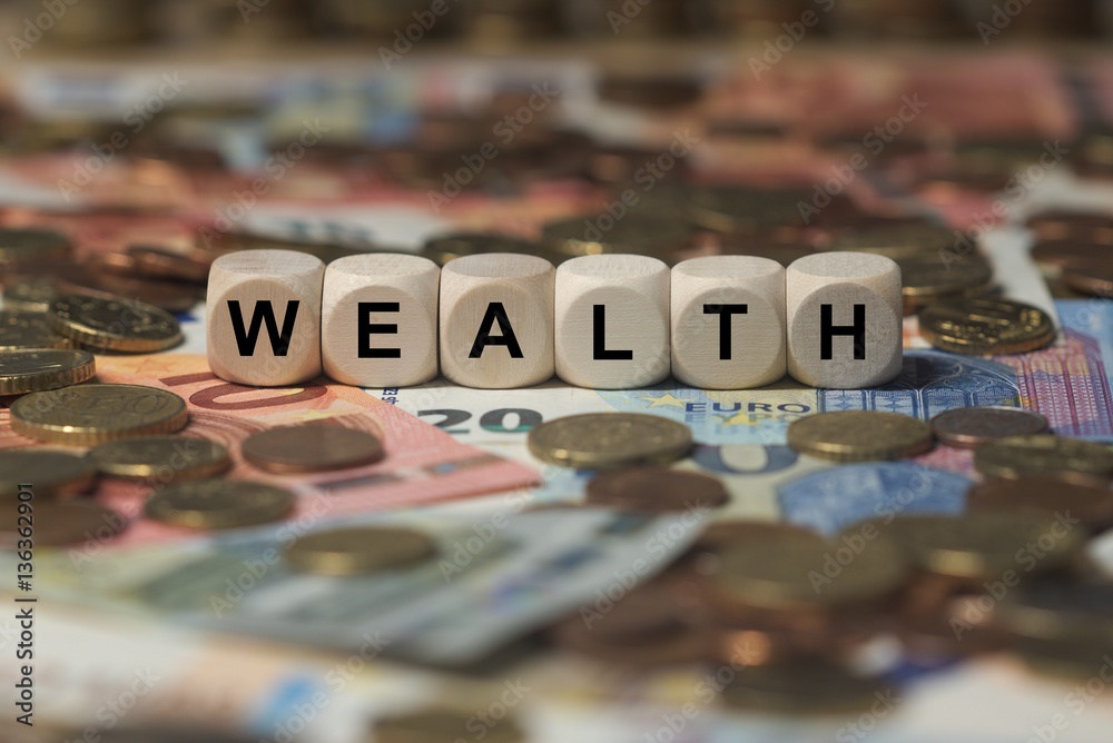 Wall Mural wealth - cube with letters, money sector terms - sign with wooden cubes