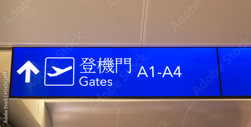 Illuminated sign with gate numbers at Taiwanese airport