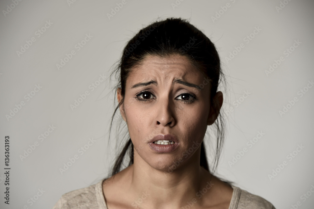 Φωτογραφία young beautiful hispanic sad woman serious and concerned in worried depressed fa