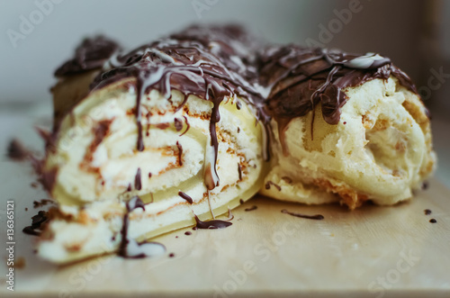 a piece of homemade biscuit cakewith chocolate sprinkles closeup photo