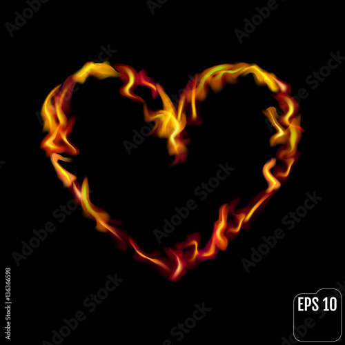 Flaming heart isolated on black background. Love symbol.