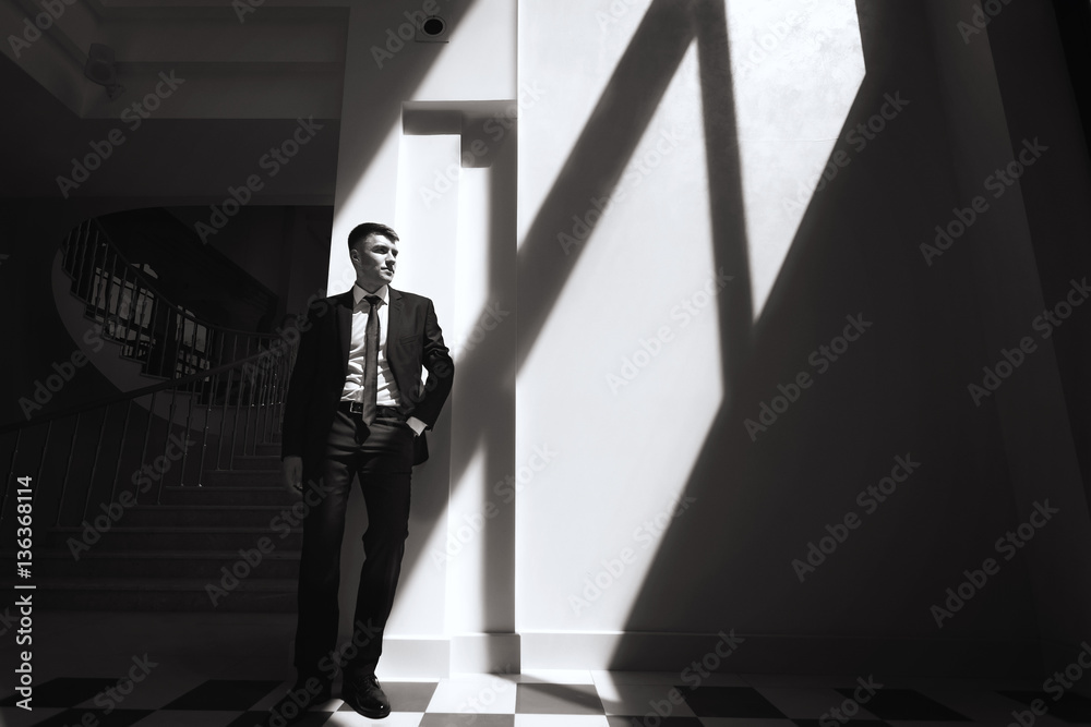 monochrome portrait of handsome man in suit monochrome portrait of handsome man in suit