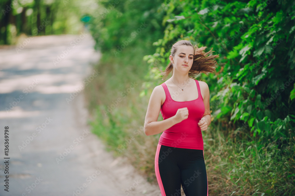 sport girl it the gym and on the jog