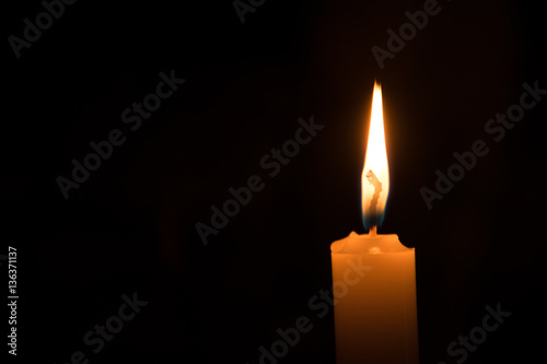 candle on the dark backgrounds