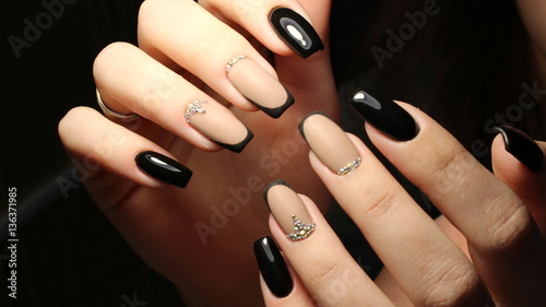 Youth manicure design, color coffee with rhinestones and black
