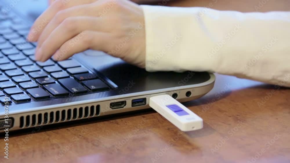 Usb Adobe Inserting the USB flash drive. Shot of inserting the USB flash drive ...