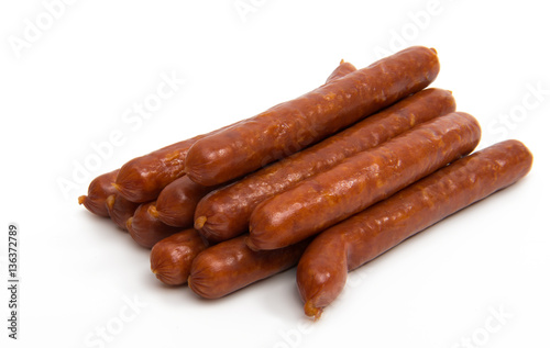 dried sausages on white background