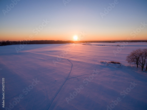 snowy winter field with a bird s-eye view