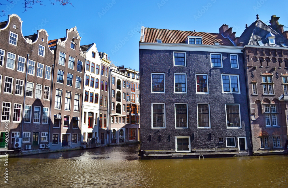 houses in front of the canals Amsterdam Holland - european architecture