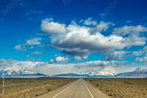 Argentina, Patagonia. Beautiful patagonian landscape with road (highway) leading to the snow covered mountains.
