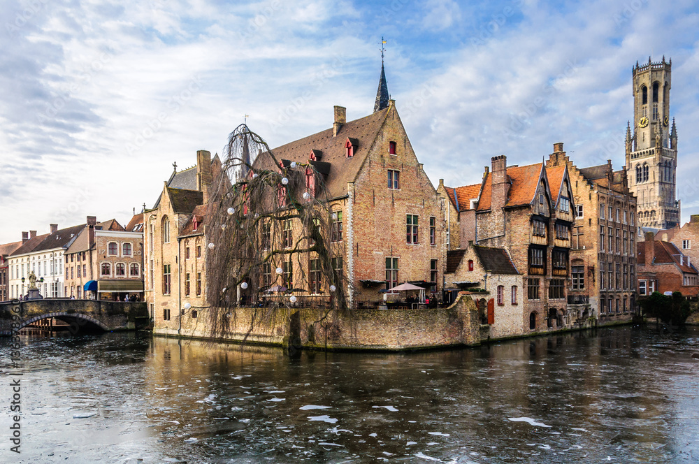 Scenery with frozen water canal in Bruges, Belgium
