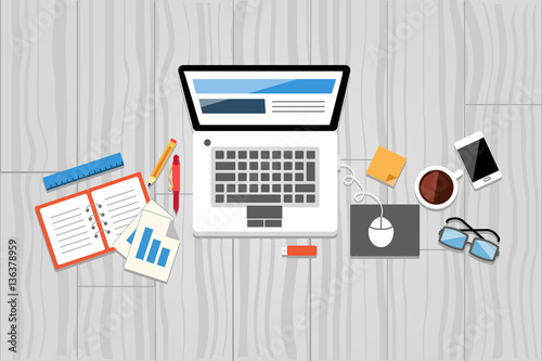 flat office working desk with mobile and laptop