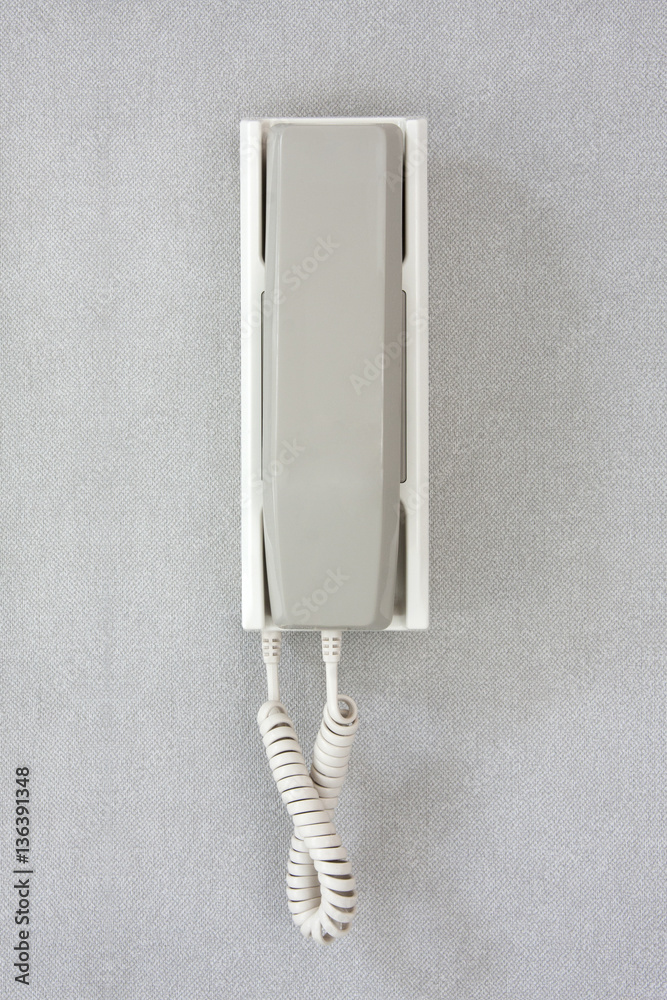 Wall phone on gray background. Wall phone on gray background.