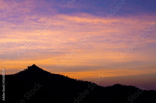 view of mountain siluate on twilight sky after sunset 